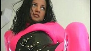Juicy rubber babe spreading - porn video